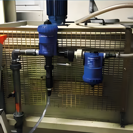 Dosatron DMIX25 inline water mixing chamber installed, 25mm (1-inch) accessory for accurate water mixing in irrigation systems.