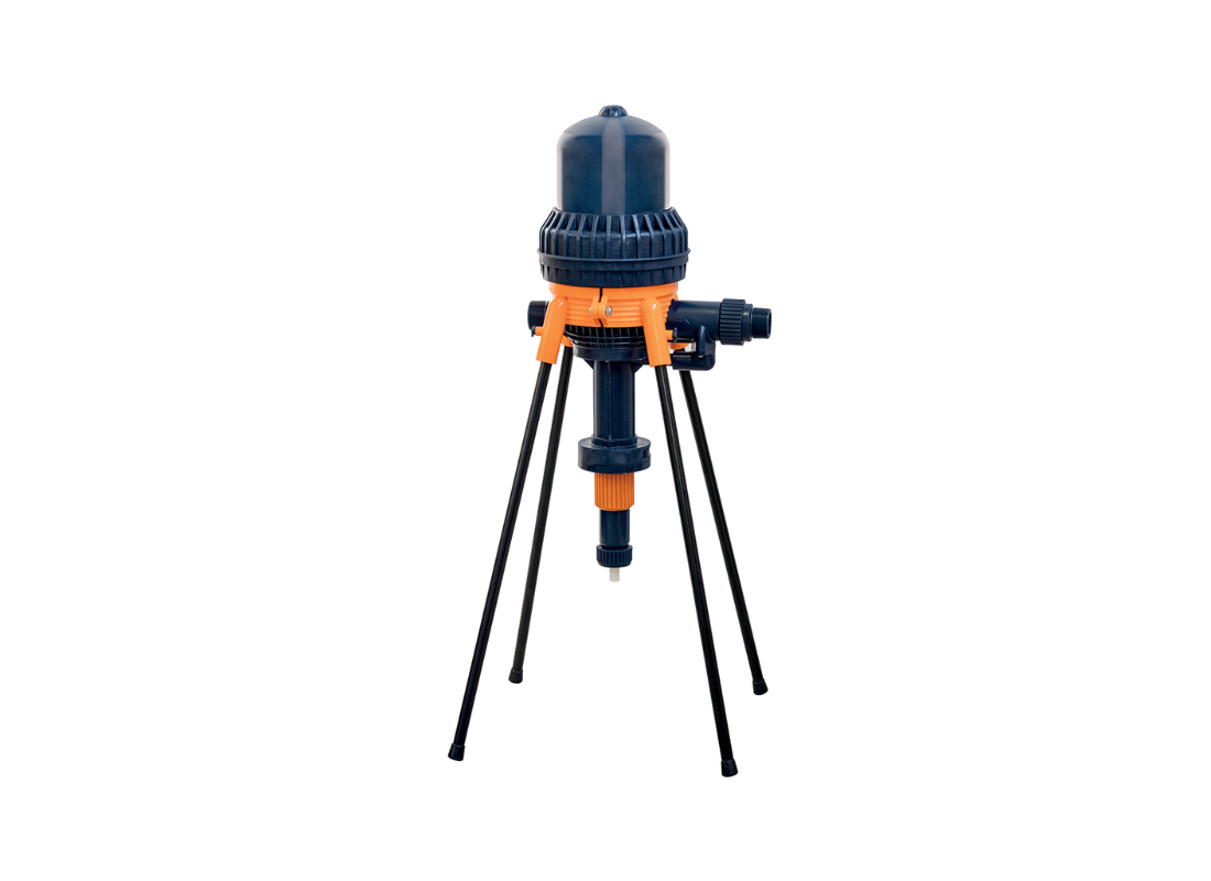 Mixtron MX1100-VF water powered dosing pump with built-in bypass, showing the compact pump with control fittings and bypass valve.