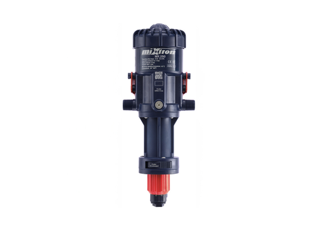 Mixtron MX250-VF water powered dosing pump with 1-10% dosing capacity, shown in a close-up view of the pump unit.